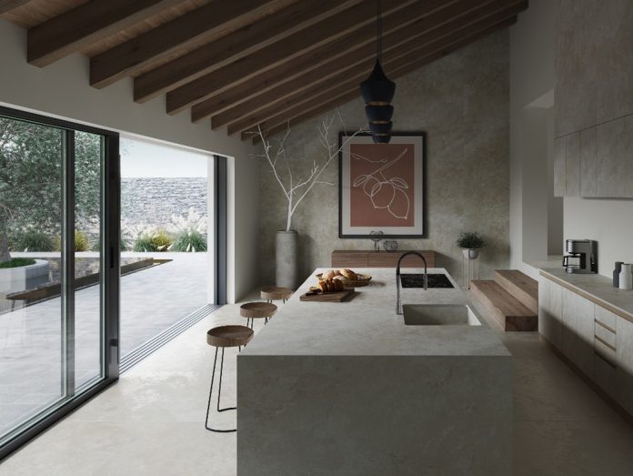 Suelo, revestimiento e isla de cocina con Neolith Rapolano